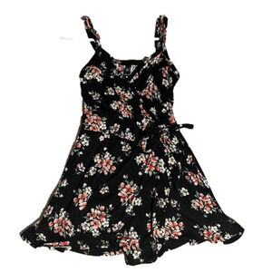 Size xs blue windsor floral romper with tie detail on side